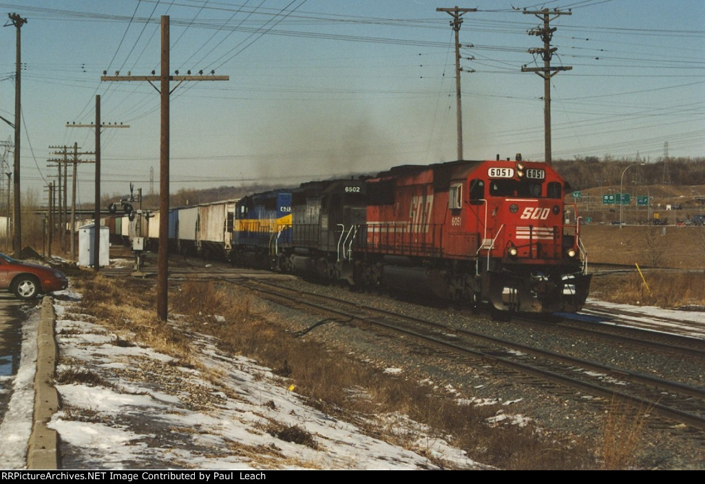 Grain train rolls east
